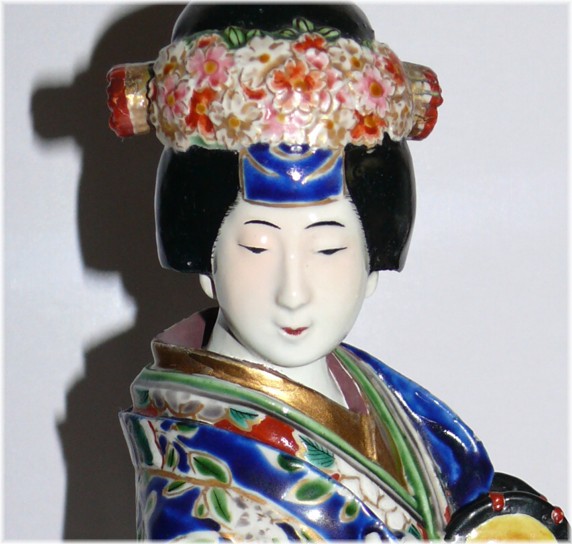 Japanese lady-musician, antique Japanese porcelain figure