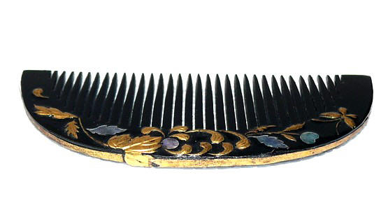 Japanese traditional hair adornment: black laquered comb with golden relief