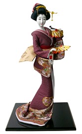 japanese traditional doll of dancing lady with two fans