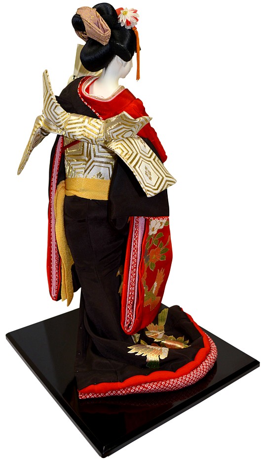Japanese tradiitional doll of a danciing woman with golden fans, 1970's