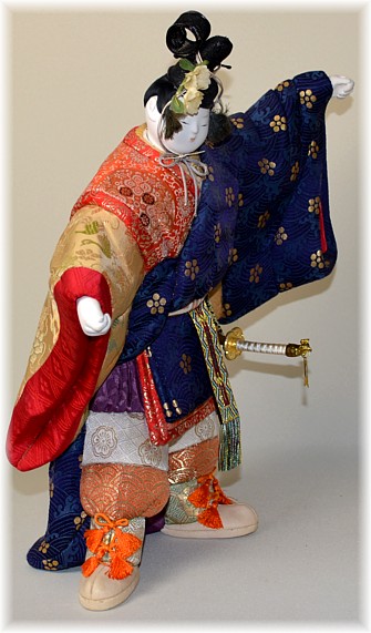 japanese traditional kimekomi doll of a courtier dancing