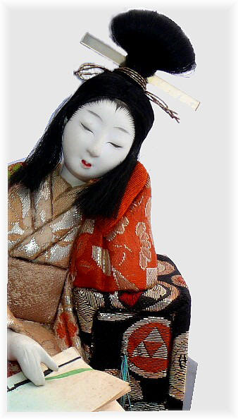 japanesekimekomi doll of a Noble Lady reading