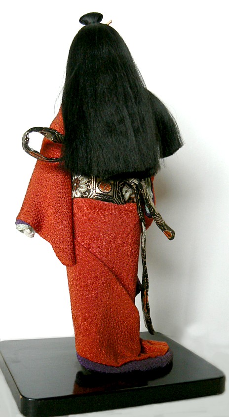Japanese antique doll of a girl  with embroidered kimono