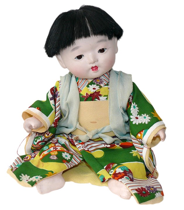 japanese antique ichimatsu doll of a child in green kimono, 1930's 