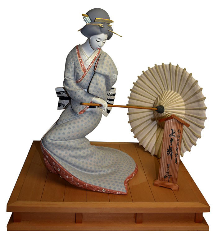 Japanese masterpiece Hakata clay figurine of a dancing young geisha with umbrella