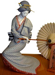 japanese hakata geisha doll dancing with umbrella open
