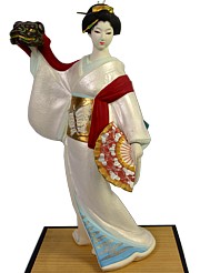 japanese hakata doll of a dancing geisha with lion mask in her hand