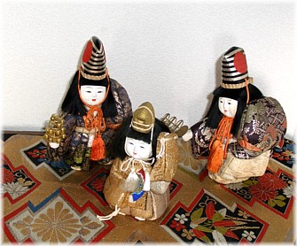 japanese traditiona dolls on obi belt