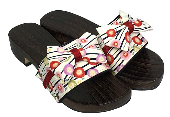 apanese woman's traditional wooden sandals GETA