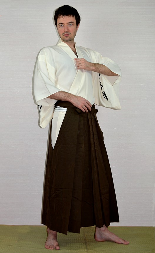 japanese man's traditional outfit:  slk hakama, silk kimono, obi belt